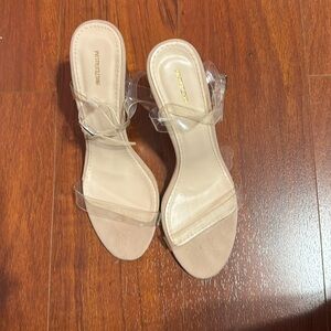 Clear heels only worn once .